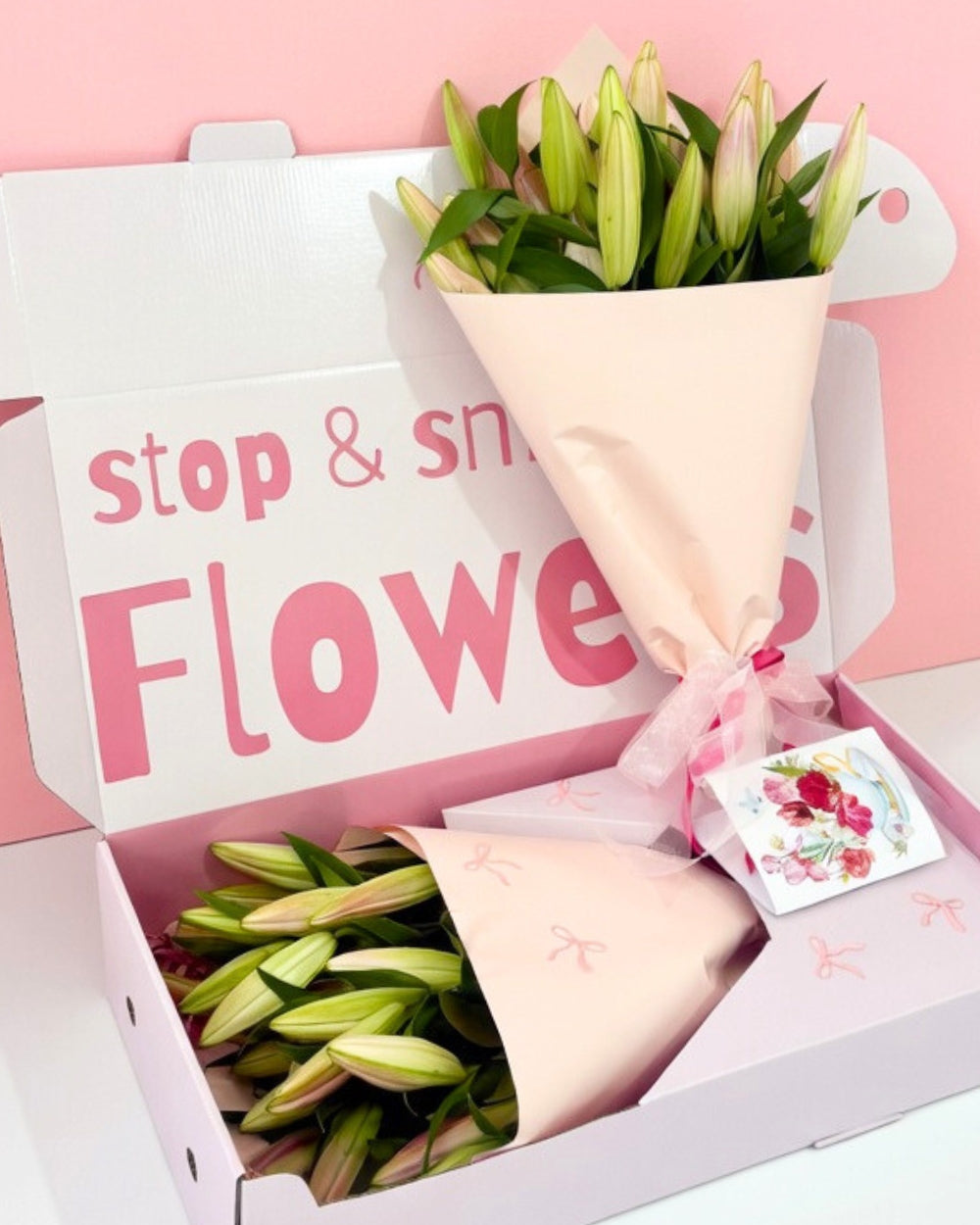 The Lily Bouqk pink and white oriental lilies in a Bouqk gift box