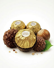 Five gold wrapped Ferrero Rocher chocolates